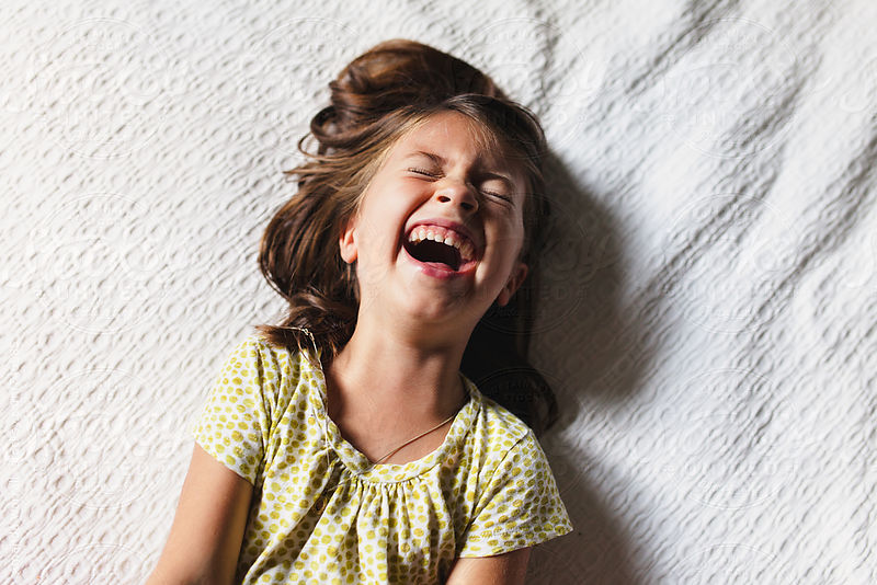 Young girl laughing